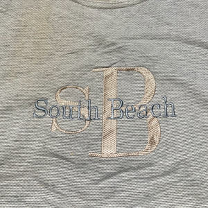 South Beach embroidery melange sweatshirt⁠